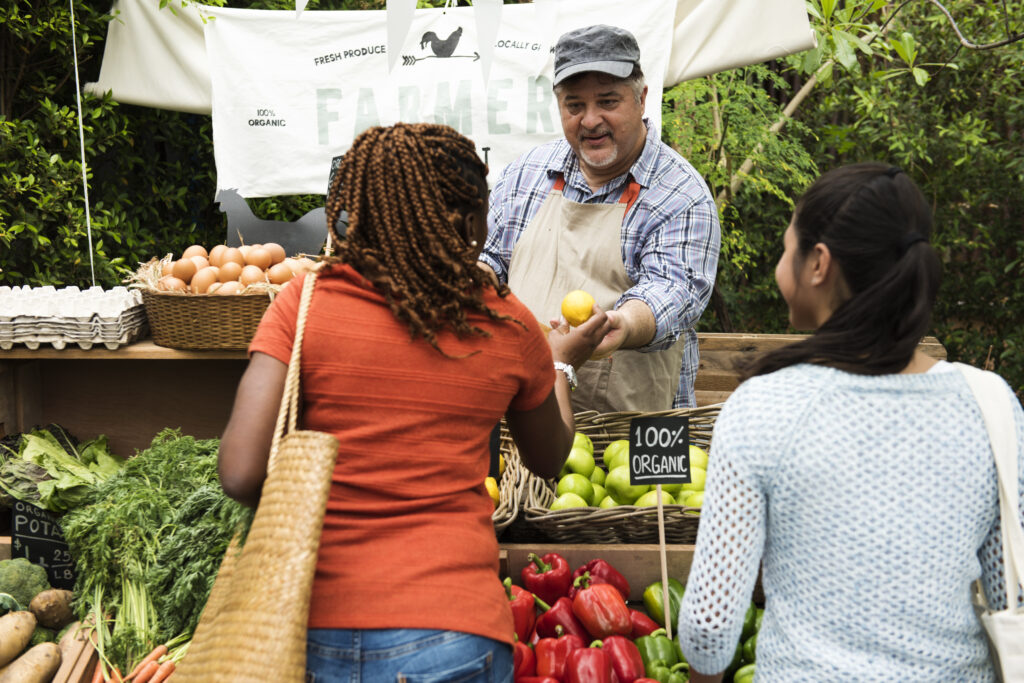 People shopping at an organic market